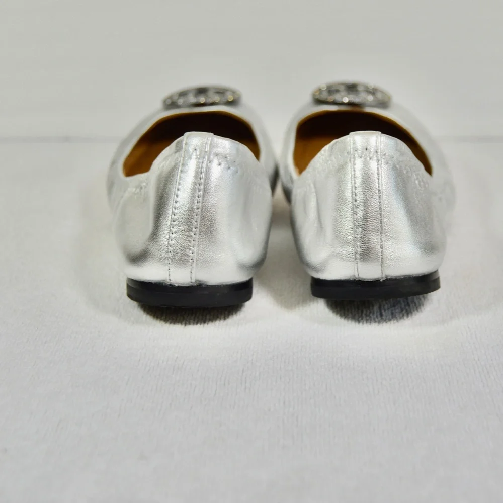 Tory Burch Women's Liana Round Toe Rhinestone Logo Metallic Leather Ball…